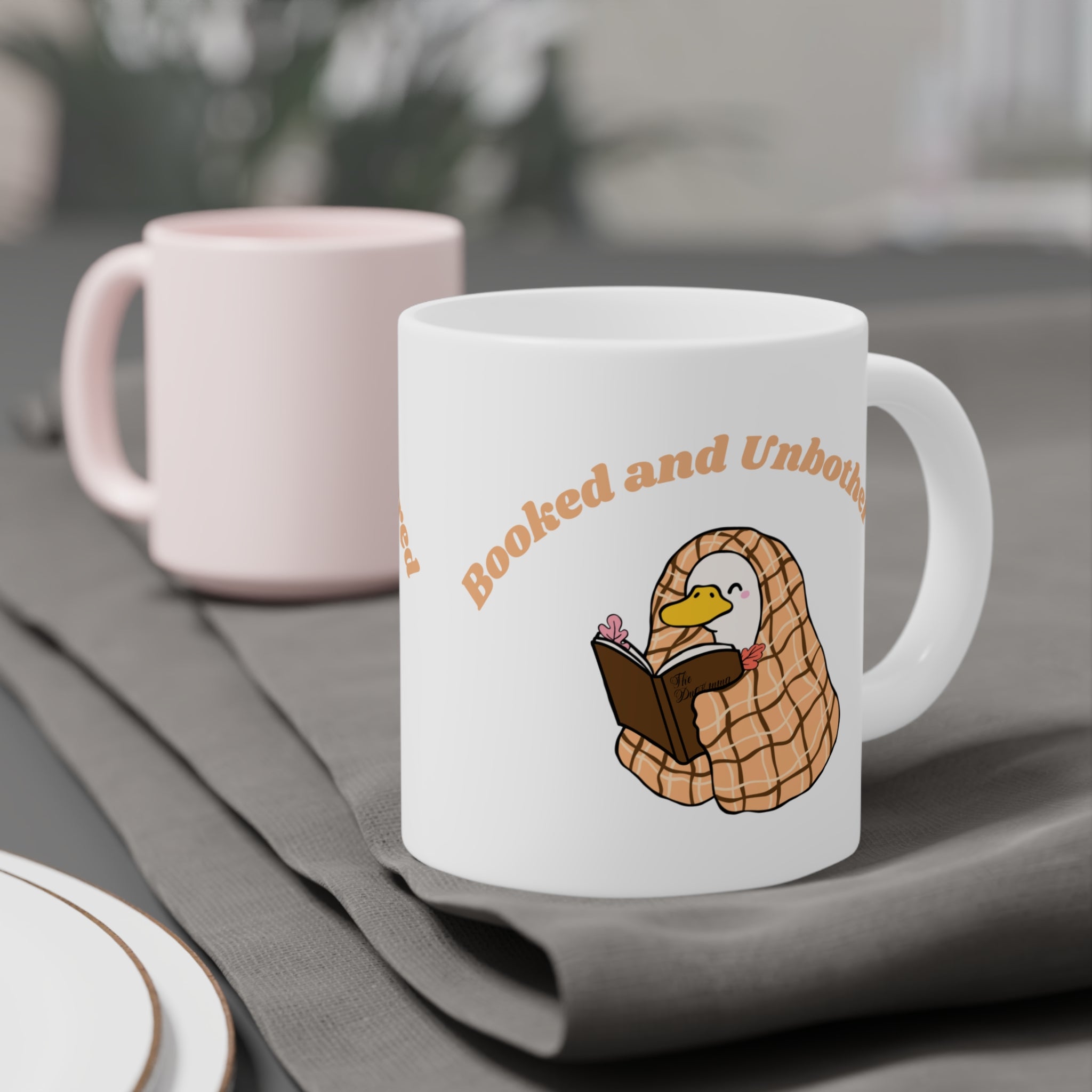Mug — "Booked and Unbothered"